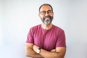 headshot of man with glasses