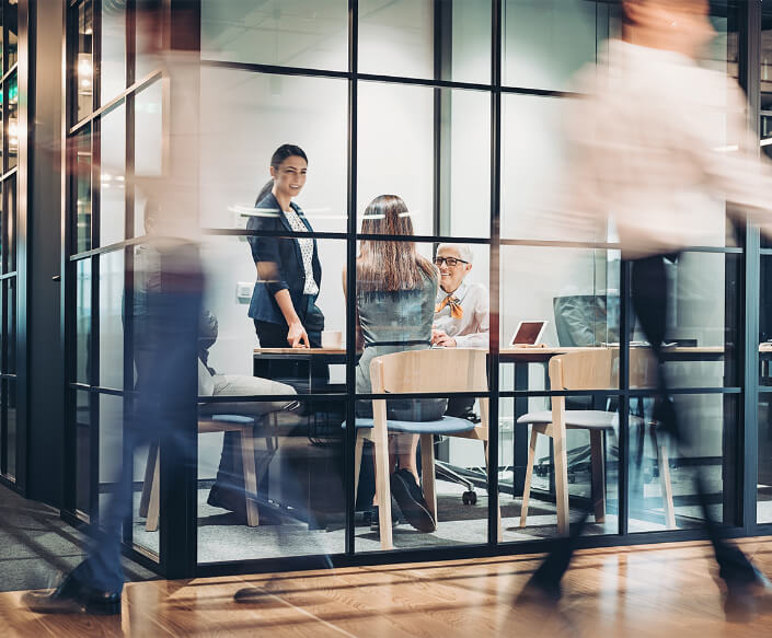 People walking in an office setting