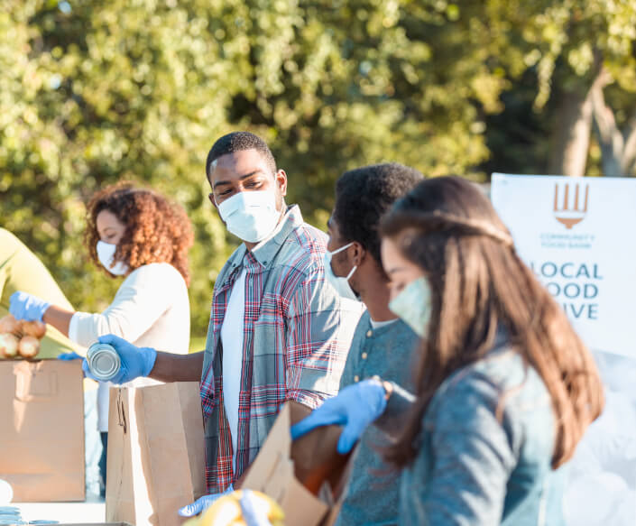 People packing up food