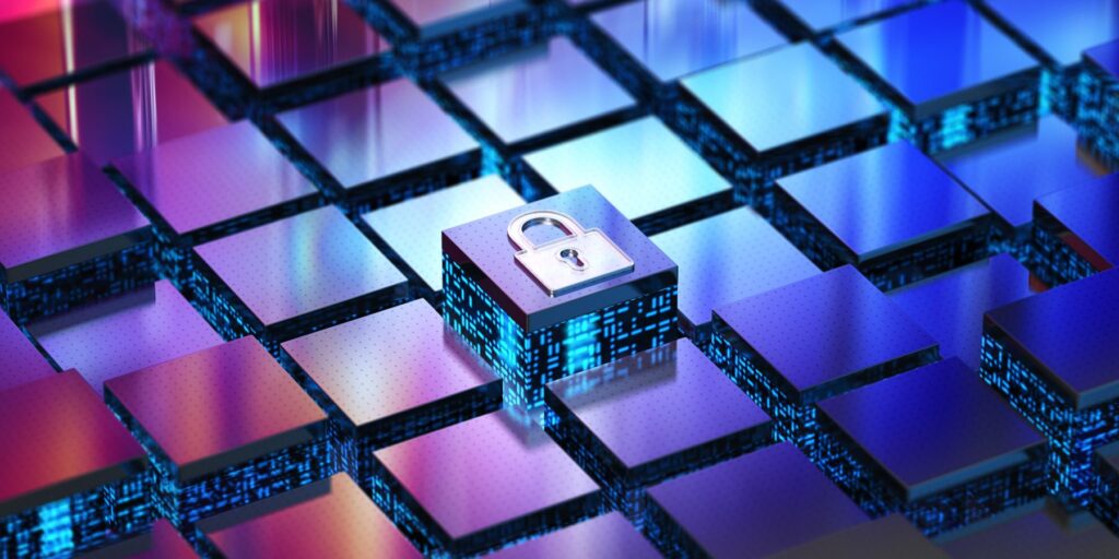 The image is a digital composition that symbolizes cybersecurity in the realm of technology. It features a multitude of three-dimensional cubes in a grid pattern, illuminated in hues of blue and purple, creating a visually striking digital landscape. Atop one of the central cubes rests a silver padlock, glowing with a subtle light. The padlock serves as a metaphor for security within the digital or cyber domain, representing the protection of data and information systems. The overall aesthetic of the image is sleek and futuristic, embodying the concept of advanced security measures in the field of information technology.