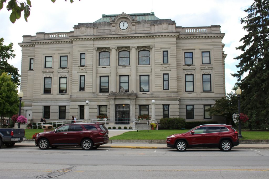 Limestone county courthouse with a clock above the entrance
