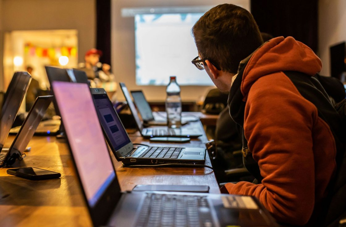 Attendee at a laptop during a classroom training session