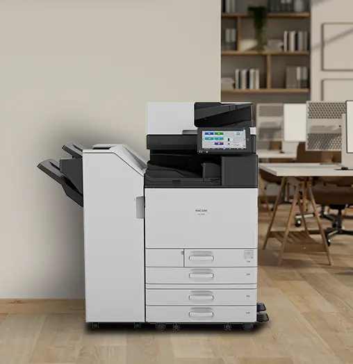 Ricoh IM 7010 multifunction printer with finisher in an office
